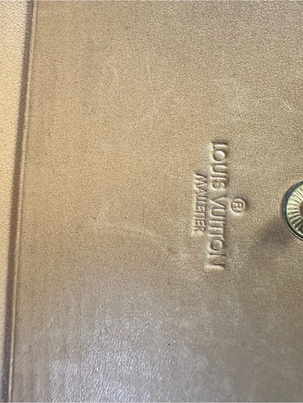Louis Vuitton Embossed Logo Leather Wallet in Beige-Tan